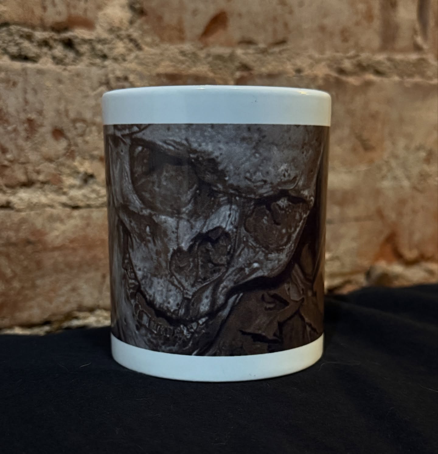 I got some coffee mugs made with one of my painting images on it…