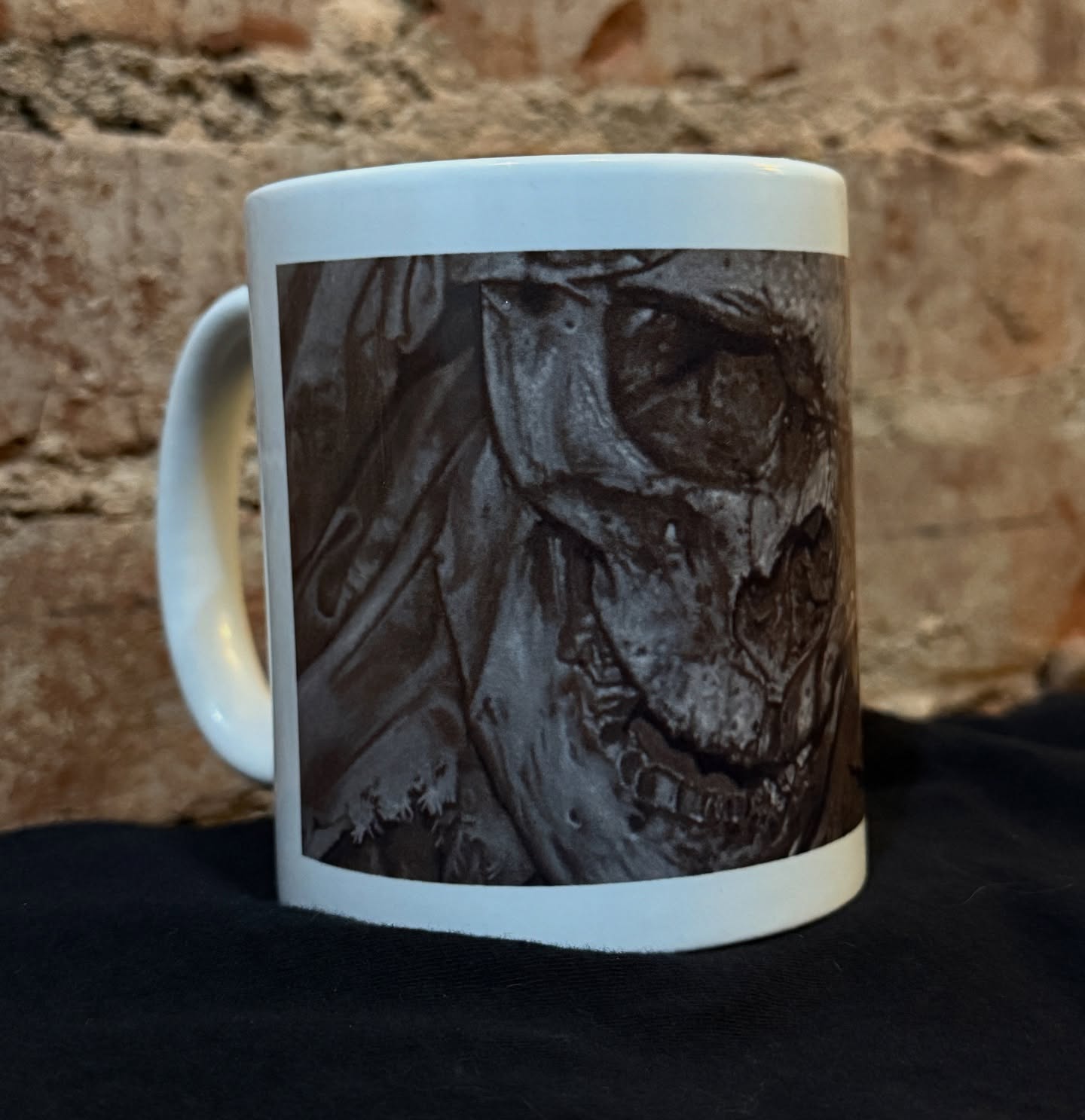 I got some coffee mugs made with one of my painting images on it…